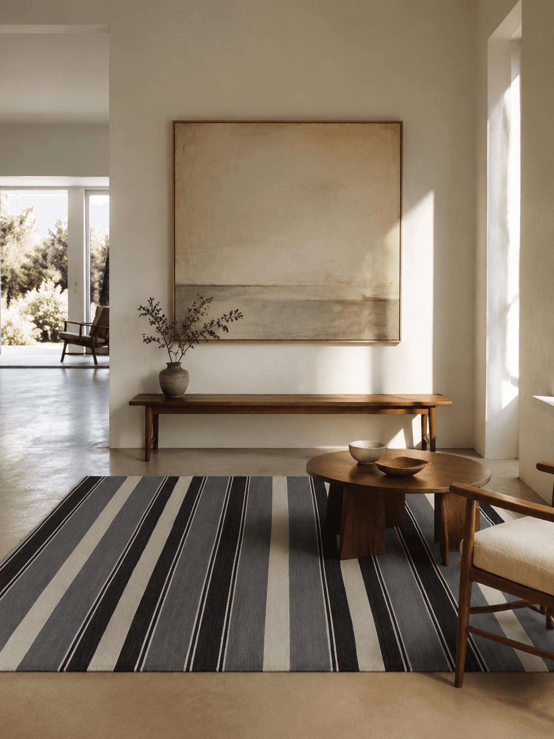 A gallery-like Cape Town room with a hand-woven Mae kelim
